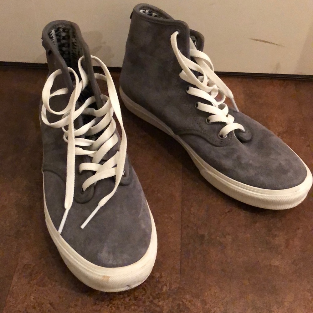 Vans high top sneakers.